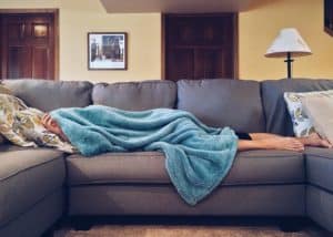 Lady sleeping on sofa