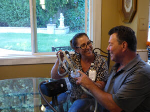 CPAP coach helping client with mask